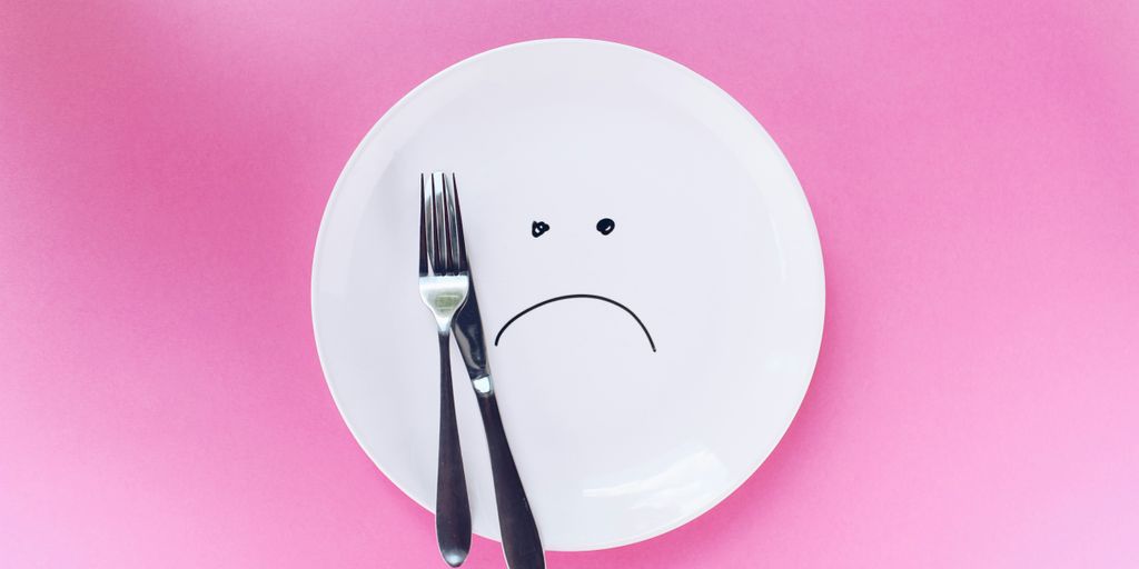 silver fork and knife on plate